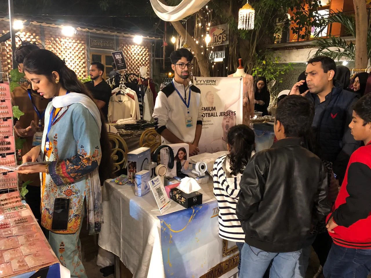 Visitors exploring the stall