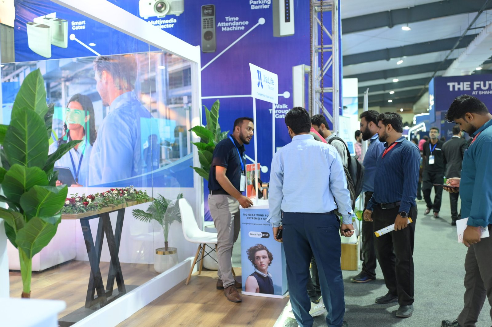 JISULIFE at ITCN Asia 2026, Expo Centre Karachi — Meeting visitors at the exhibition